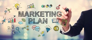 Businessman drawing Marketing Plan concept